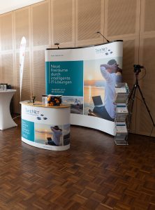 Messestand der TAKENET auf dem IT-Forum Mainfranken 2024