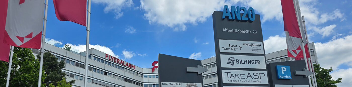 Gebäude des AN20 mit dem Firmenschild der MetaComp Würzburg GmbH